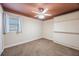 Cozy bedroom with a murphy bed, modern ceiling fan and neutral colored walls at 12425 Touchton Dr # 77, Tampa, FL 33617