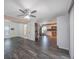 Open living area flowing into the kitchen, equipped with a washer and dryer at 12425 Touchton Dr # 77, Tampa, FL 33617