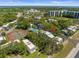 Aerial view of property with a red arrow indicating the unit at 1303 N Mcmullen Booth Rd # 1303, Clearwater, FL 33759