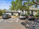 Front exterior view of condo building with three parking spaces at 1303 N Mcmullen Booth Rd # 1303, Clearwater, FL 33759