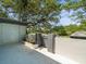 Enclosed outdoor patio with a gate and an exterior door at 1303 N Mcmullen Booth Rd # 1303, Clearwater, FL 33759