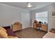 Bright office/den featuring a large window, ample storage, and stylish decor at 1310 Country Trails Dr, Safety Harbor, FL 34695