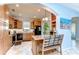 Kitchen with an island, stainless appliances, granite counter tops and wood cabinets at 1324 Eckles Dr, Tampa, FL 33612