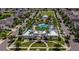 Aerial shot of community center showcasing the building, greenery, and an inviting archway entrance at 13355 Palmerston Rd, Riverview, FL 33579