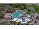 Aerial view of the community featuring a pool, clubhouse, and other outdoor amenities at 13355 Palmerston Rd, Riverview, FL 33579