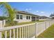 This backyard has a well-maintained lawn and privacy fence at 13355 Palmerston Rd, Riverview, FL 33579