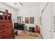 Fun bedroom with a playful decor, a dresser with TV, and ample space for activities at 13355 Palmerston Rd, Riverview, FL 33579
