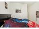 Inviting bedroom featuring vibrant bedding and wall decor that creates a lively space at 13355 Palmerston Rd, Riverview, FL 33579