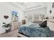 Bright bedroom featuring neutral colors, dresser, tv and soft carpet at 13355 Palmerston Rd, Riverview, FL 33579