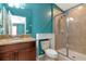 Bathroom featuring granite vanity, tile flooring, and a glass enclosed shower with chrome shower head at 1505 Trailwater St, Ruskin, FL 33570