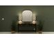 Inviting entryway with a stylish console table, decorative lamps, and potted plants at 17512 Shirewood Way, Land O Lakes, FL 34638