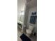 Modern bathroom featuring a double vanity, organized shelving, and stylish fixtures at 1799 N Highland Ave # 32, Clearwater, FL 33755