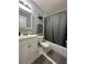 Well-maintained bathroom featuring a shower-tub combination and a stylish vanity at 1799 N Highland Ave # 32, Clearwater, FL 33755