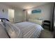 Cozy bedroom features a comfortable bed, serene decor, and calming natural light at 1799 N Highland Ave # 32, Clearwater, FL 33755