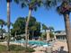 Beautiful community pool area with lounge chairs and shade, ideal for enjoying sunny days at 1799 N Highland Ave # 32, Clearwater, FL 33755
