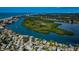 Aerial view of community with water and houses at 18201 Gulf Blvd # 201, Redington Shores, FL 33708