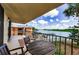 Relax on this balcony with seating and a beautiful view of the water at 18201 Gulf Blvd # 201, Redington Shores, FL 33708