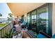 Spacious balcony showcasing water views, storage and boat docks, perfect for relaxing and enjoying waterfront living at 18201 Gulf Blvd # 201, Redington Shores, FL 33708
