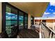 Balcony area with table and chairs plus waterfront views at 18201 Gulf Blvd # 201, Redington Shores, FL 33708