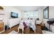 Bedroom featuring a dresser, a bed with throw pillows, and hardwood floors at 18201 Gulf Blvd # 201, Redington Shores, FL 33708