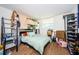Bedroom featuring a unique lofted bed and ladder to access sleeping area with plenty of room to play at 18201 Gulf Blvd # 201, Redington Shores, FL 33708