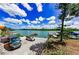 This property features a waterfront exterior view, boat dock, and ample parking at 18201 Gulf Blvd # 201, Redington Shores, FL 33708