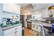 Kitchen showcasing white cabinets, stainless steel appliances, and granite countertops at 18201 Gulf Blvd # 201, Redington Shores, FL 33708