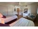 Spacious bedroom with twin beds, dresser, and walk-in closet at 2255 Philippine Dr # 21, Clearwater, FL 33763