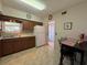 Well-maintained kitchen with eat-in table and view to the front yard through the sink window at 2255 Philippine Dr # 21, Clearwater, FL 33763