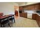 Functional kitchen featuring ample counter space and modern appliances, including oven and dishwasher at 2255 Philippine Dr # 21, Clearwater, FL 33763