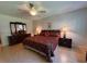 Cozy main bedroom with warm lighting, elegant furnishings, and a relaxing atmosphere at 2255 Philippine Dr # 21, Clearwater, FL 33763