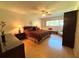 Well-lit main bedroom with ample space, a ceiling fan, and comfortable furnishings at 2255 Philippine Dr # 21, Clearwater, FL 33763