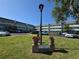 South Seas building sign with red potted plants on a sunny day at 2255 Philippine Dr # 21, Clearwater, FL 33763
