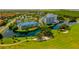 Gorgeous aerial image highlighting community residences nestled beside the water and a beautifully manicured golf course at 2323 Feather Sound Dr # F101, Clearwater, FL 33762