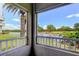 Enjoy serene views of the pond, lush landscaping, and golf course from this screened balcony at 2323 Feather Sound Dr # F101, Clearwater, FL 33762