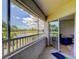 This screened balcony offers stunning golf and water views, inviting peaceful relaxation at 2323 Feather Sound Dr # F101, Clearwater, FL 33762