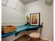 Walk-in closet featuring a corner desk space and wire shelving at 2323 Feather Sound Dr # F101, Clearwater, FL 33762