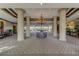 Grand lobby with soaring ceilings, elegant chandelier, and welcoming seating areas at 2323 Feather Sound Dr # F101, Clearwater, FL 33762