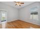 Bedroom with hardwood floors, natural light, and closet for storage at 2816 Pankaw Ln, Valrico, FL 33596