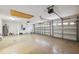 Spacious garage with ample storage and multiple overhead doors at 2816 Pankaw Ln, Valrico, FL 33596