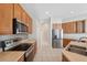 Well-equipped kitchen featuring stainless steel appliances and ample counter space at 2816 Pankaw Ln, Valrico, FL 33596