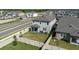 A well-maintained backyard featuring green grass and a white fence provides a private outdoor space at 3047 Adams Cross Dr, Zephyrhills, FL 33540