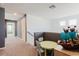 Upstairs loft space with a play table and view of the hallway at 3047 Adams Cross Dr, Zephyrhills, FL 33540