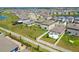 Aerial view of a community featuring fenced-in backyards and neighborhood ponds at 31440 Barrel Wave Way, Wesley Chapel, FL 33545