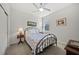 Cozy bedroom with comfortable bed, small nightstand, and ample natural light at 3159 Marisa Pl, Holiday, FL 34691