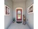 Charming front entrance with a decorative door, stylish decor, and inviting entryway at 3159 Marisa Pl, Holiday, FL 34691