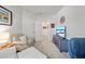 Cozy living room featuring modern furniture and a wall-mounted TV at 3159 Marisa Pl, Holiday, FL 34691