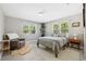Cozy bedroom offering natural light and space for relaxation, perfect for a serene retreat at 317 N Washington Ave, Clearwater, FL 33755