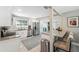 Bright kitchen featuring stainless steel appliances, granite counters and a breakfast bar with seating at 317 N Washington Ave, Clearwater, FL 33755