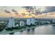 Waterfront high-rise building exteriors along the bay at sunset, offering luxury living at 3435 Bayshore Blvd # 2100P, Tampa, FL 33629